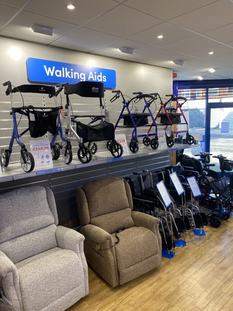 Interior of Premier Community's Carlton Mobility Store showing walking aids and riser recliners