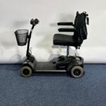 Approved Used Pride Go Go Elite Traveller in grey, with 12 ah batteries and mesh basket