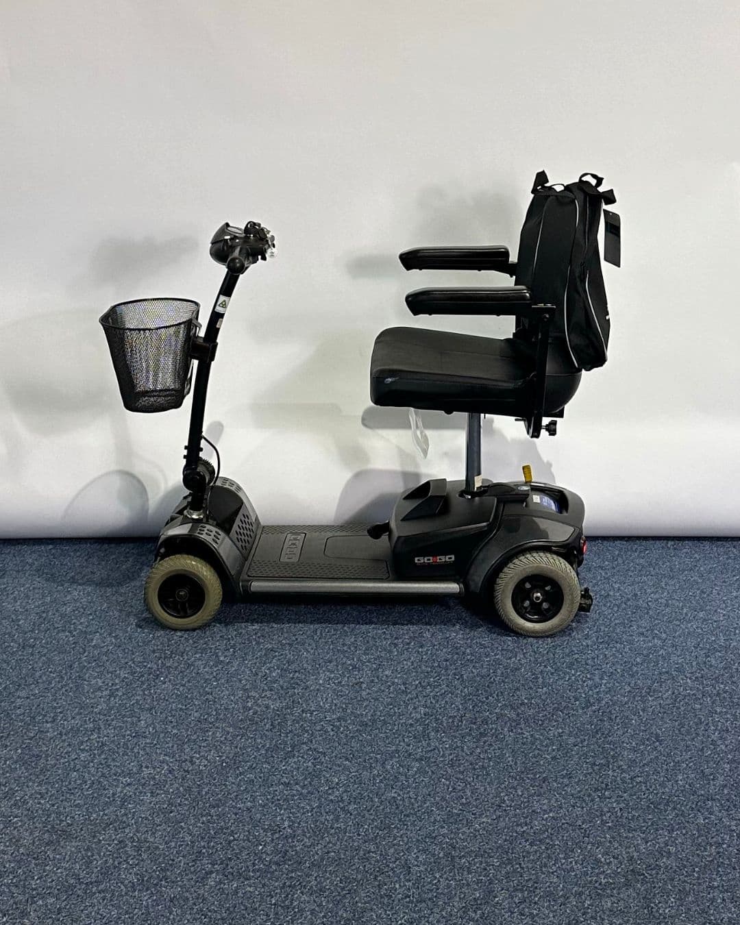 Approved Used Pride Go Go Elite Traveller in grey, with 12 ah batteries and mesh basket