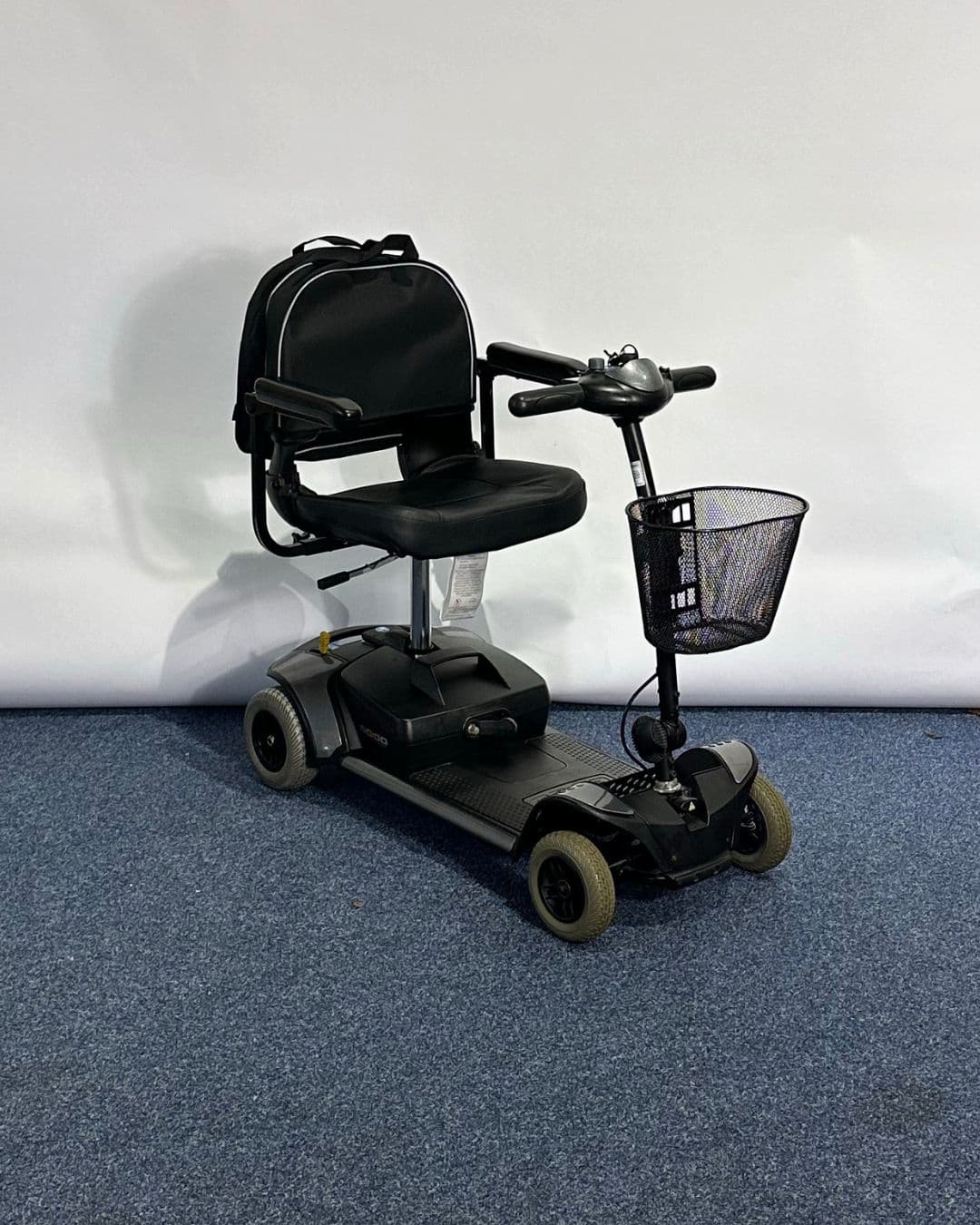 Approved Used Pride Go Go Elite Traveller in grey, with 12 ah batteries and mesh basket