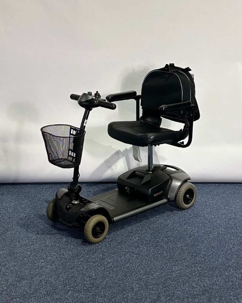 Approved Used Pride Go Go Elite Traveller in grey, with 12 ah batteries and mesh basket