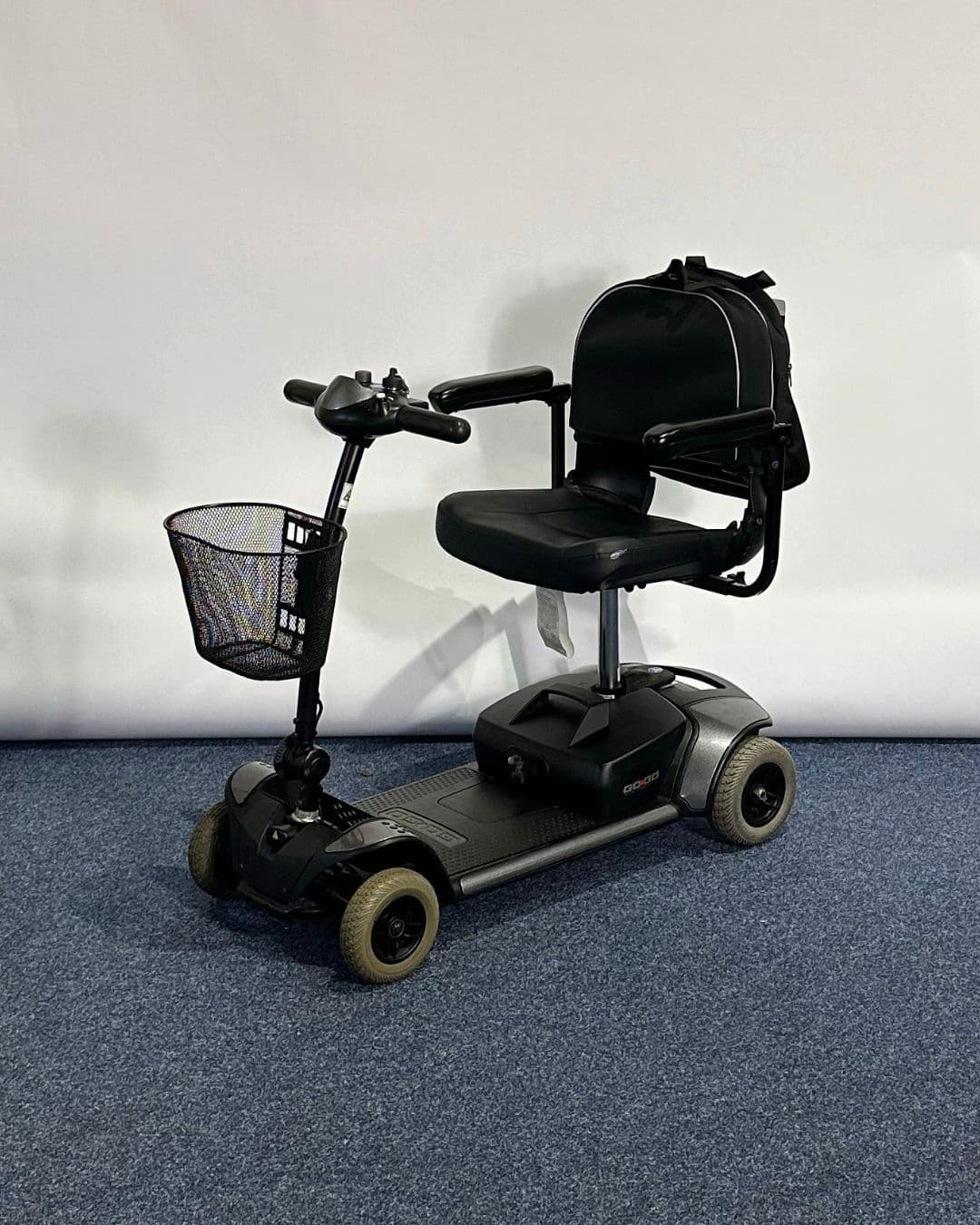 Approved Used Pride Go Go Elite Traveller in grey, with 12 ah batteries and mesh basket