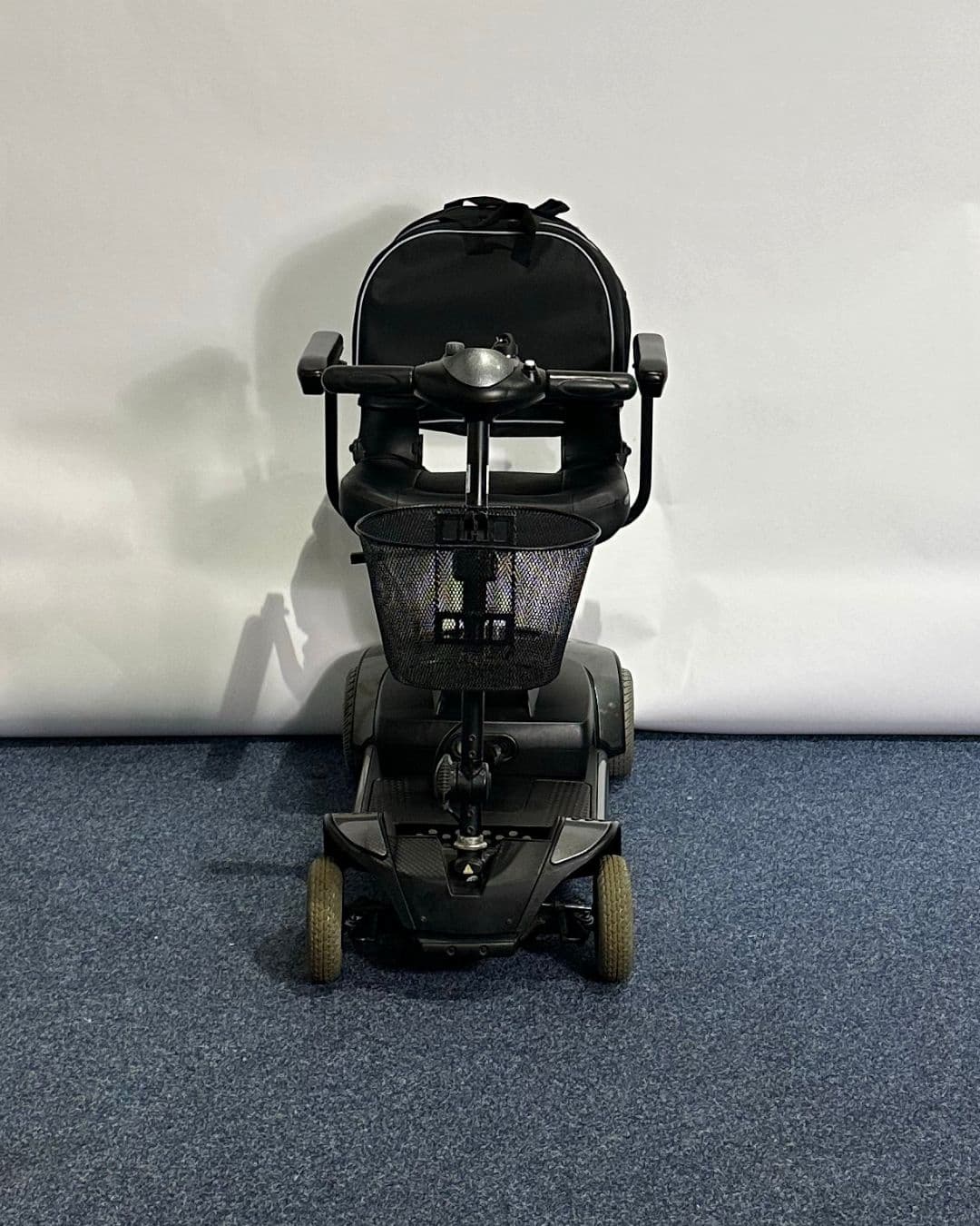 Approved Used Pride Go Go Elite Traveller in grey, with 12 ah batteries and mesh basket