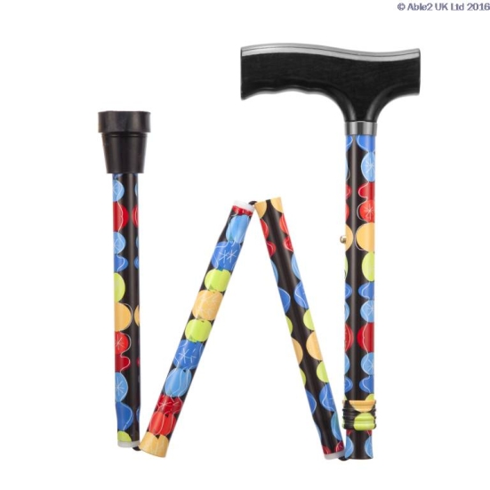 Able2 Adjustable Folding Walking Sticks Blue Spots folded slightly in a W shape on a white background.