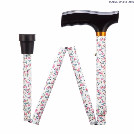 Able2 Adjustable Folding Walking Sticks folded slightly in a W shape on a white background.
