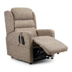 Camberley Deluxe Riser Recliner - foot rest raised on a white background.