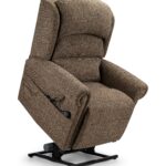 A Sitting Pretty Dorchester riser recliner inclined on a white background.