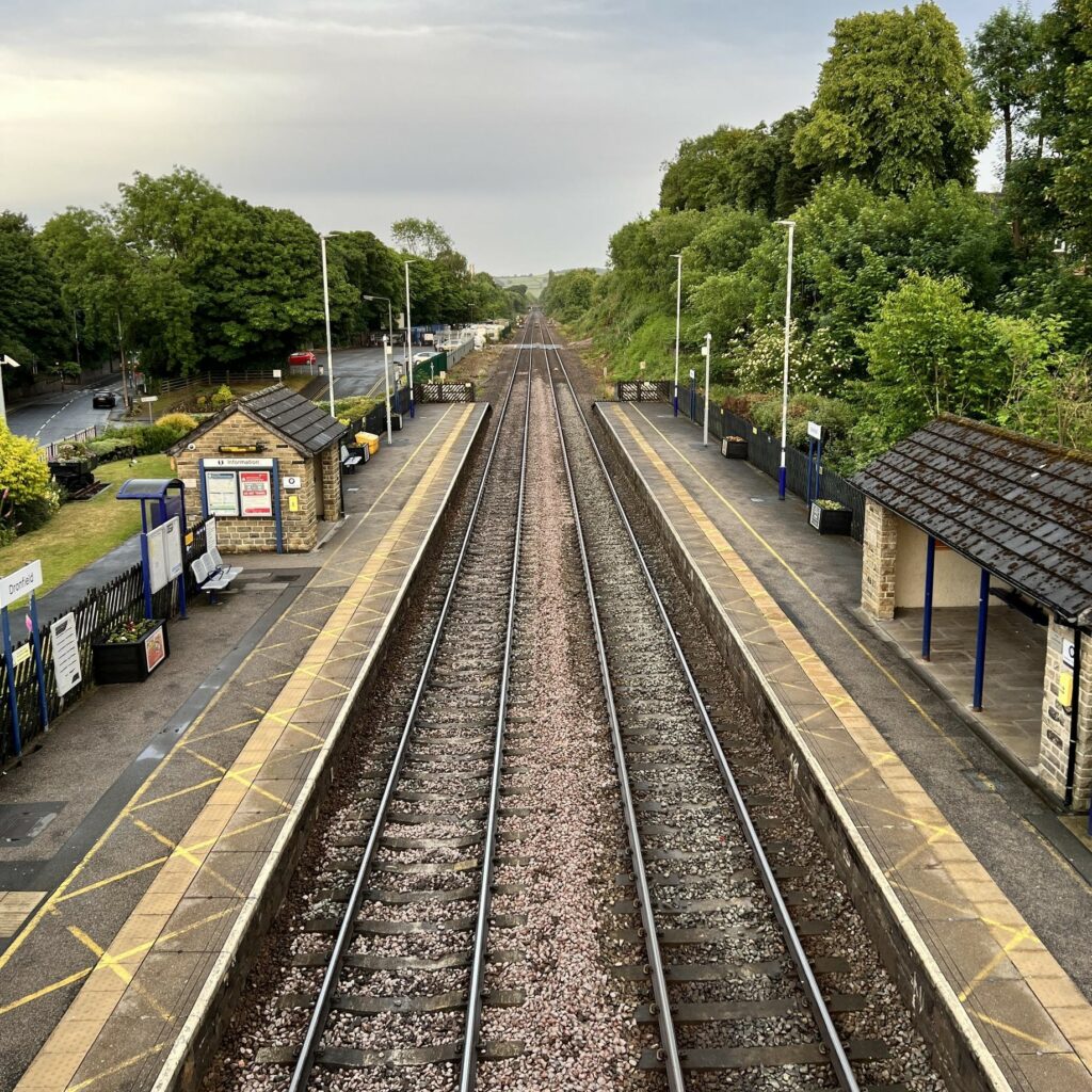 Image of Dronfield railway station stretching ahead into the horizon. Used to identify Premier Community's home care in Dronfield location.