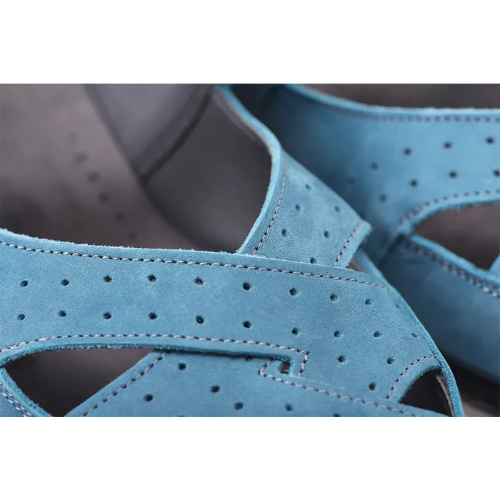 A close up of the a pair of Cosyfeet Shelley Ocean on a white background.