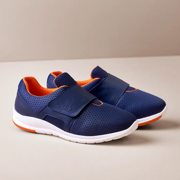 Cosyfeet Vamos Navy on a cream table wallpaper.