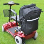 Splash Giant Bag on the back of a red Mobility Scooter, sitting on grass