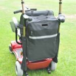 Splash Giant Bag on the back of a red Mobility Scooter, sitting on grass