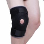 A person's knee wearing the Kedley Hinged Knee Support