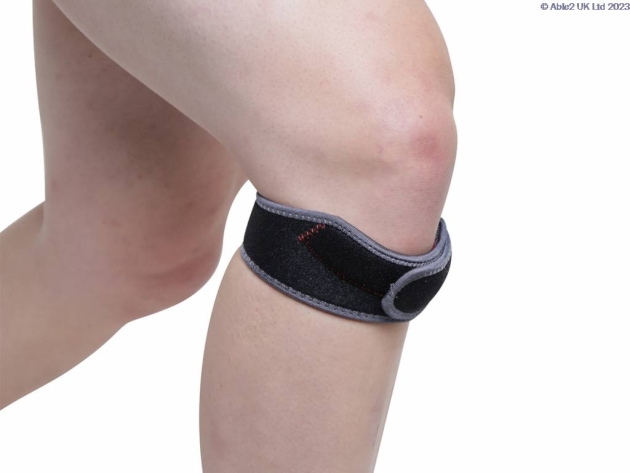 Kedley Patella Brace just below a mans knee.