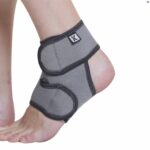 A model's foot wearing the Kedley Pro-Light Neoprene Ankle Support