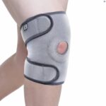 A model wearing a Kedley Pro-Light Neoprene Knee Support