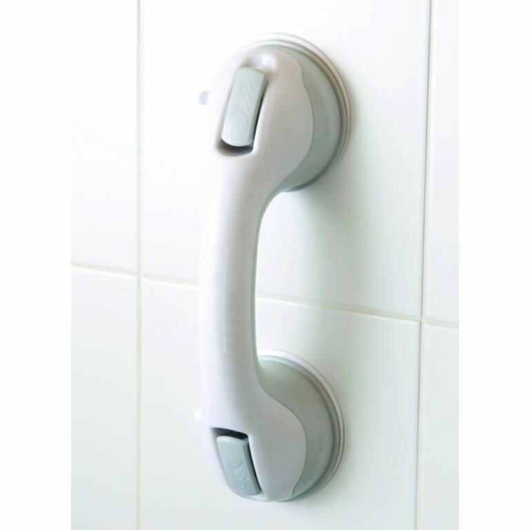 Grey Suction Hand Bar stuck onto 2 tiles in what looks like a bathroom.