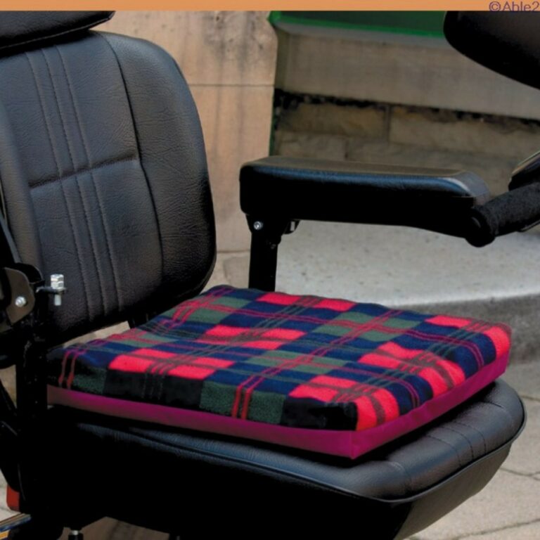 Harley Comfort Ease Cushion in Tartan Red and Black on a desk chair.