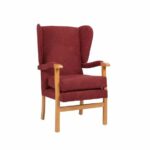 Jubilee Fireside Chair in red on a white background.