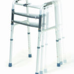 A Walking Walker blurred from moving forward with a white background.