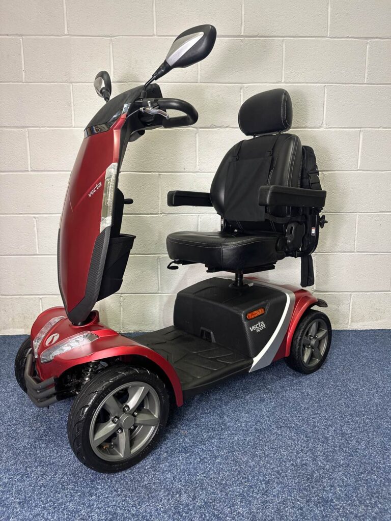 a red and black mobility scooter
