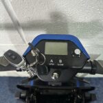 a keychain on a handlebar