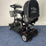 a scooter with a backpack