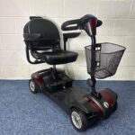 a scooter with a basket on the back