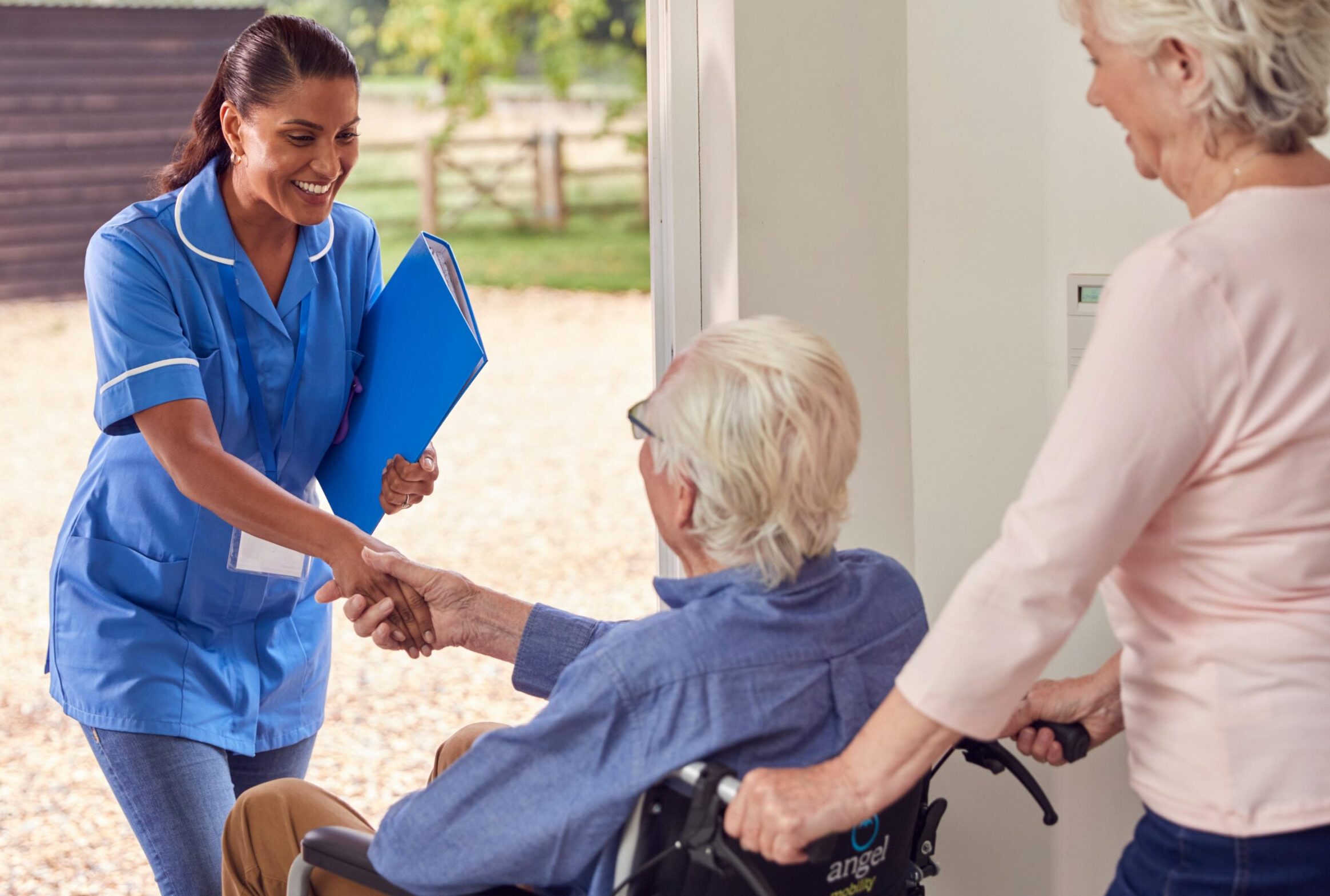 Carer introducing herself to a new family to represent home care services in Sandiacre