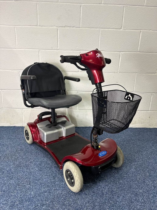 a scooter with a basket on the back