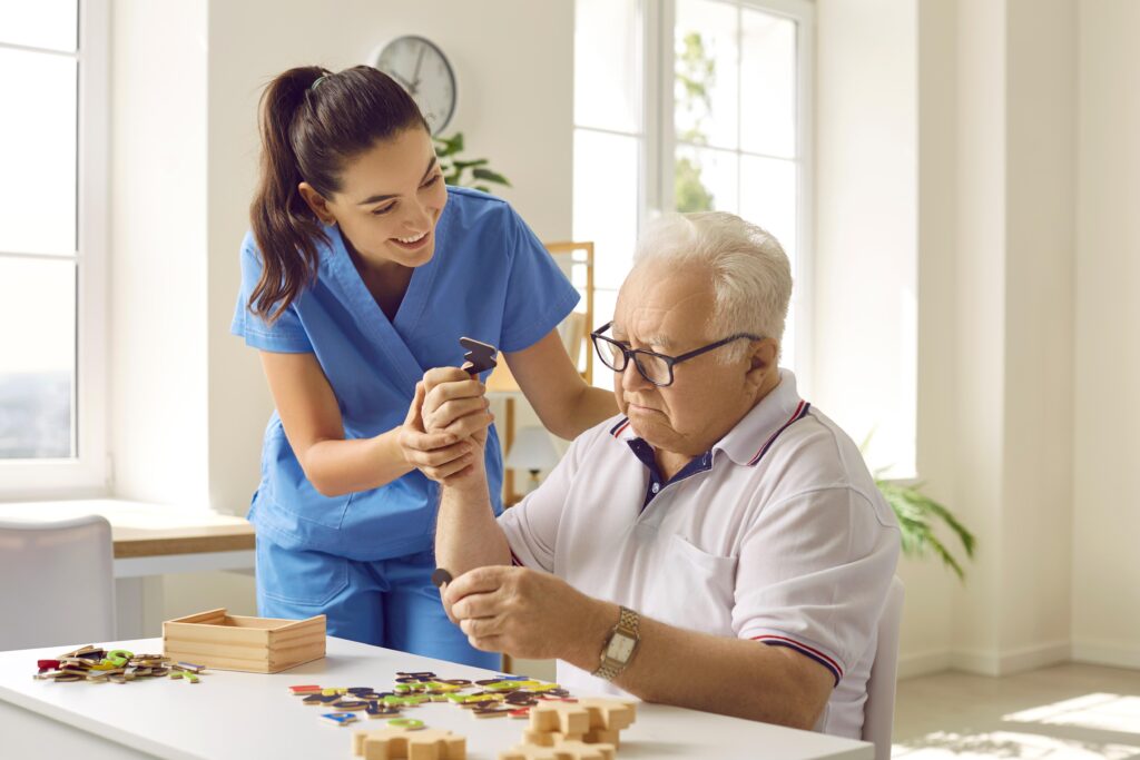 Carer with an elderly male suffering from dementia