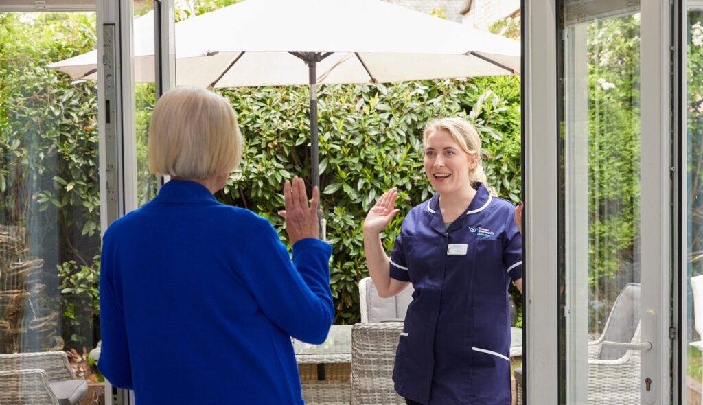 Premier Community Carer arriving for a companionship care call at a service user's house