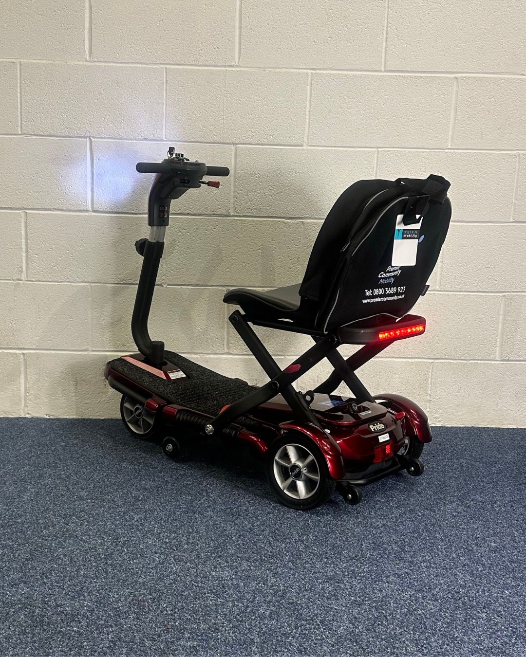 Approved Used Pride Quest, folding scooter in red