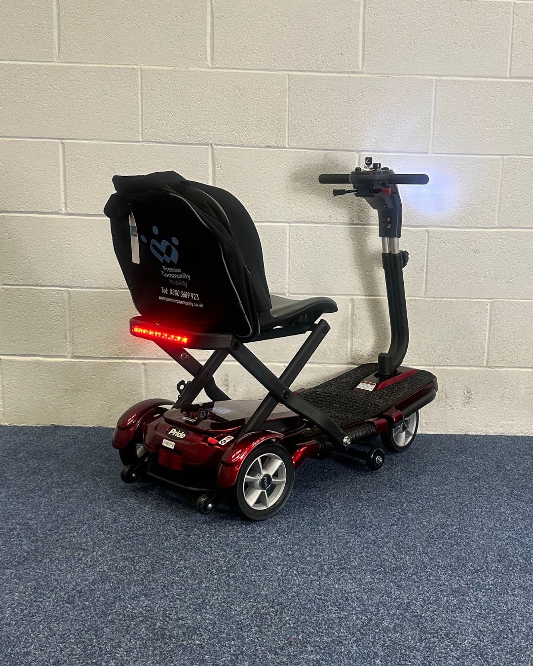 Approved Used Pride Quest, folding scooter in red