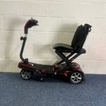 Approved Used Pride Quest, folding scooter in red