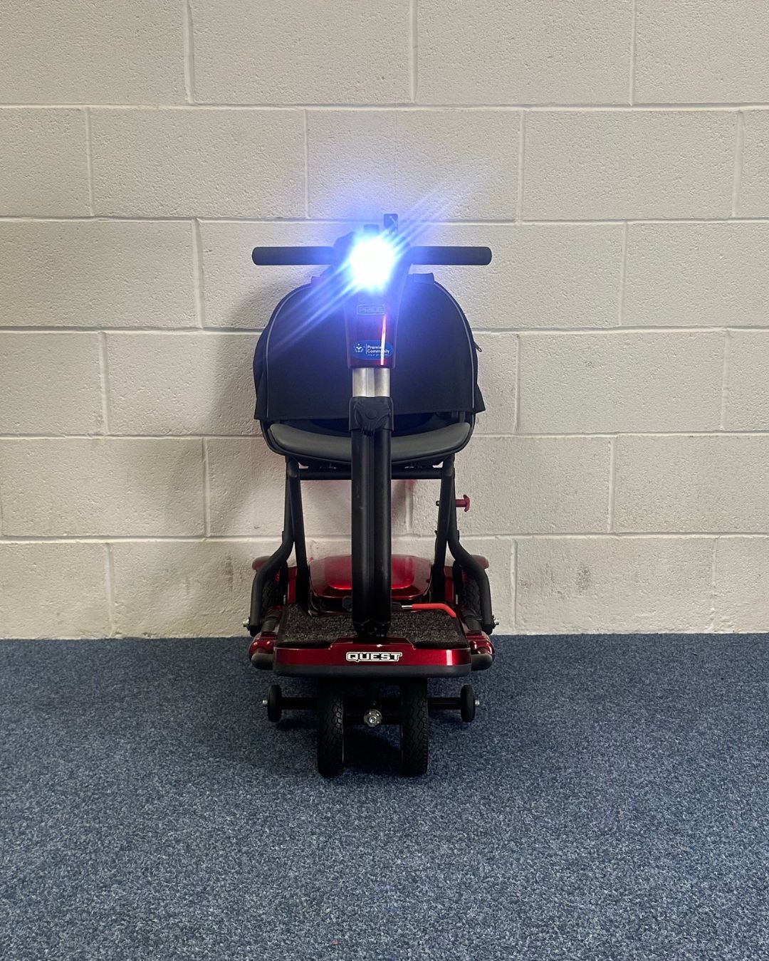 Approved Used Pride Quest, folding scooter in red