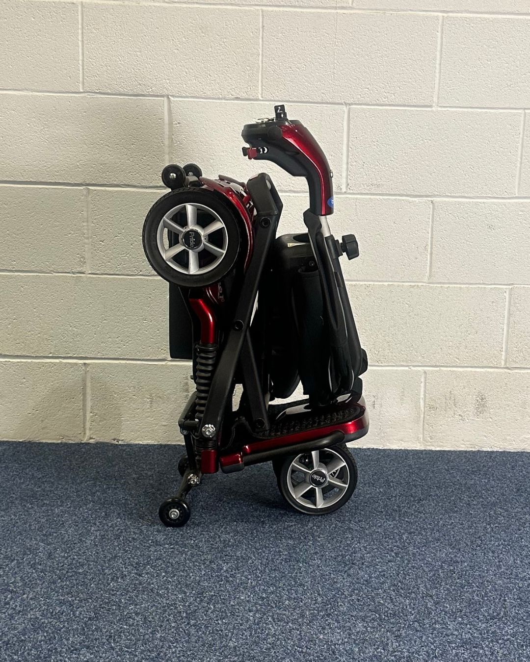 Approved Used Pride Quest, folding scooter in red