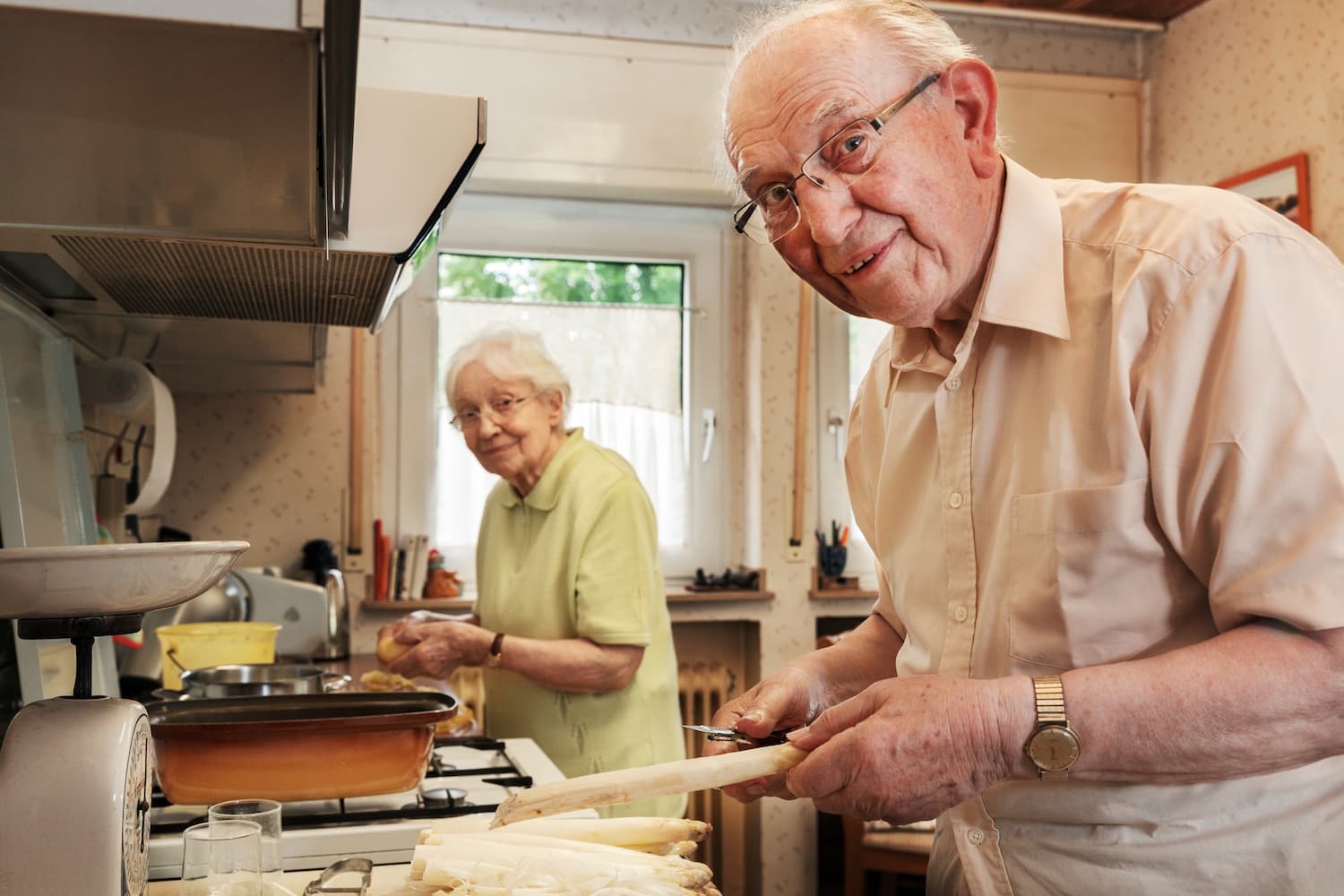 Elderly couple in a kitchen representing gas safety measures