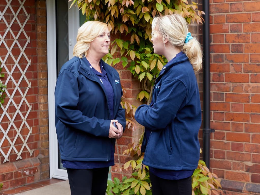 Marie and Nina talking