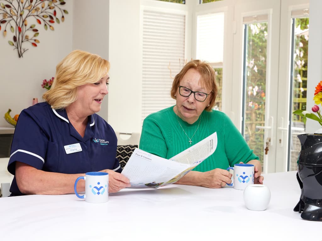 Premier Community Carer talking to a service user