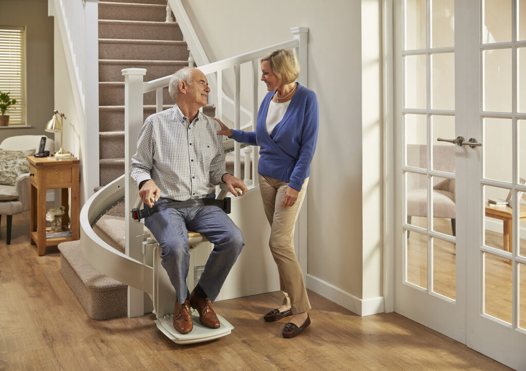 Elderly man using a stairlift