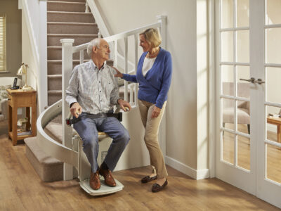 Elderly man using a stairlift